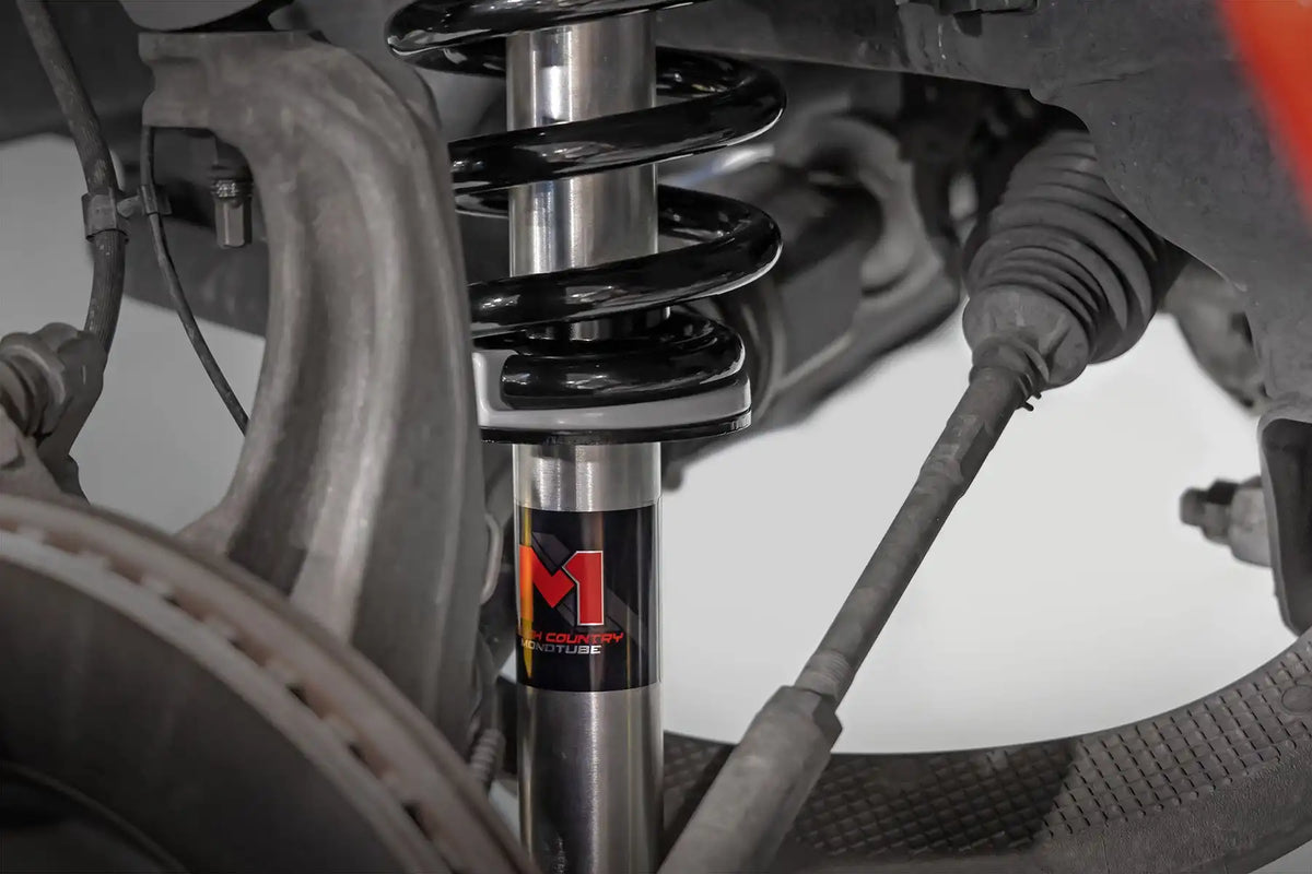 M1 ADJUSTABLE LEVELING STRUTS MONOTUBE | 0-2" | RAM 1500 (19-23)